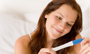 Happy woman - In Vitro Fertilization